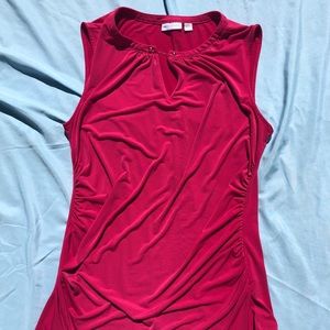 Bright pink blouse with gold chain detailing